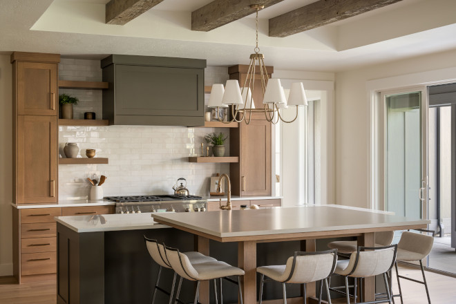 A Chandelier above kitchen island table in Idaho home