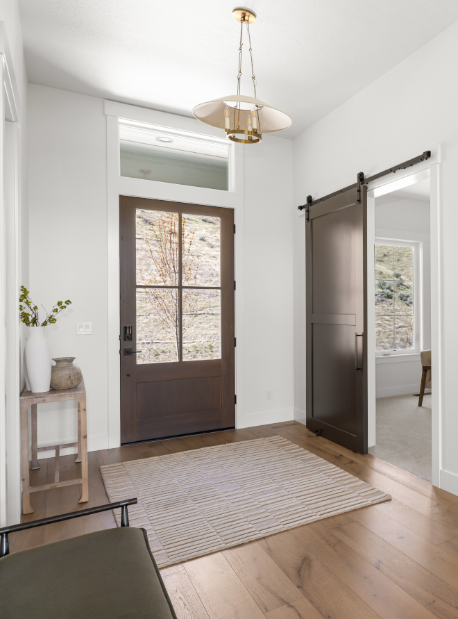 Barn door painted Sherwin Williams Urbane Bronze SW 7048 in Idaho home