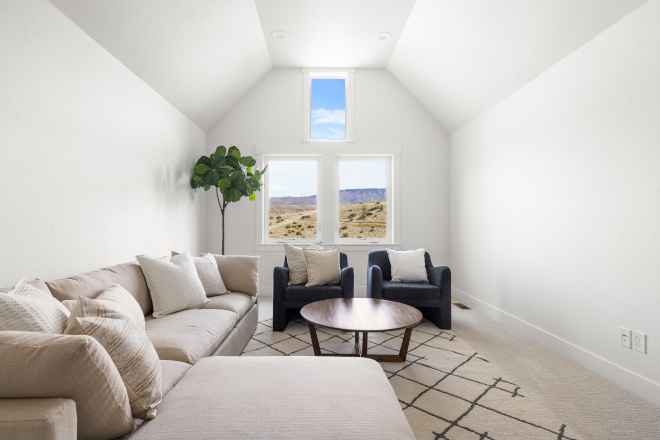 Bonus room above garage with Sherwin Williams Alabaster walls and Pure White trim in Idaho home
