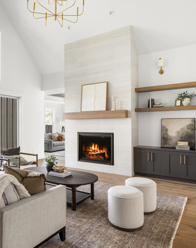 Fireplace with 24x48 neutral tile surround and Rustic Gray mantel in Idaho home