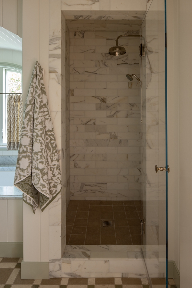 walk in shower with 3x12 marble tile and enclosed design