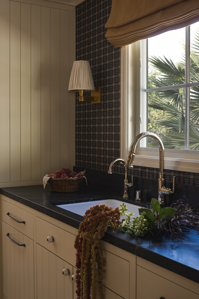 soapstone countertops paired with Benjamin Moore Clay Beige cabinetry in elegant scullery