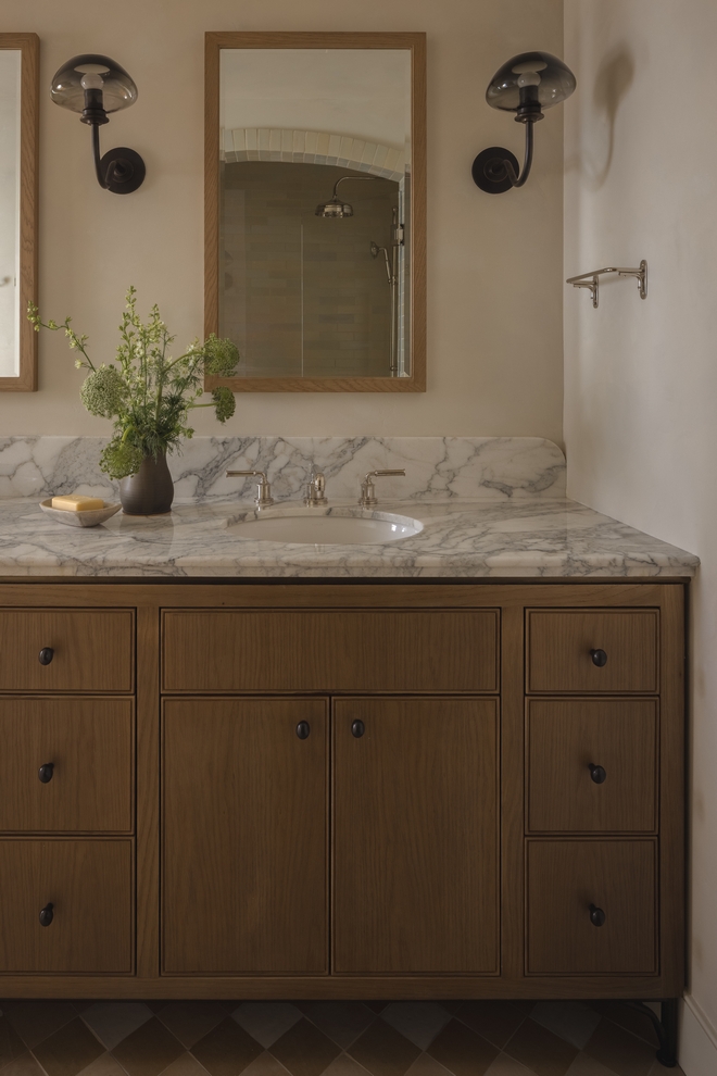white oak bathroom vanity with rounded edge countertop and matte stain finish