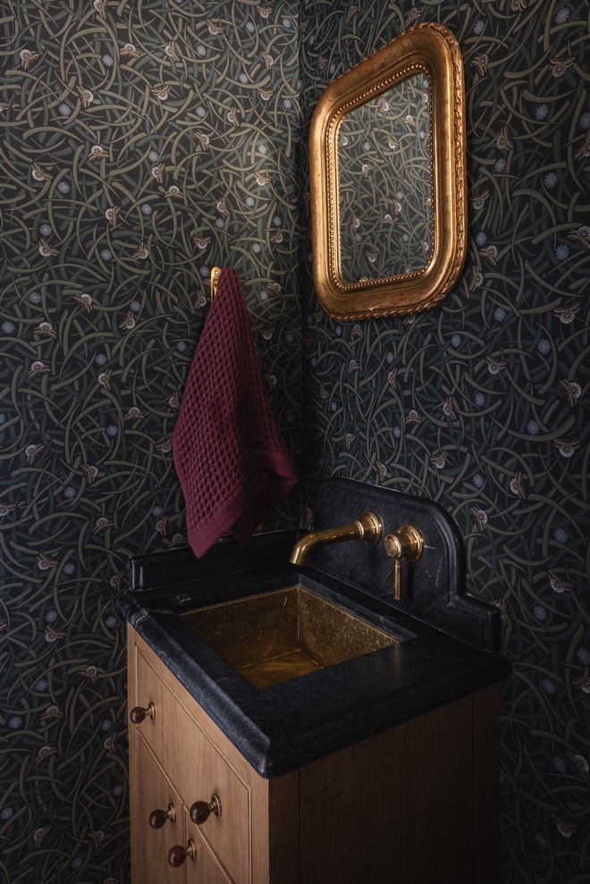 custom white oak vanity with hammered brass sink and Hotaru wallpaper