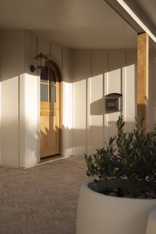 California beach cottage renovation with warm neutral palette, custom millwork, white oak details and timeless English country inspired interiors