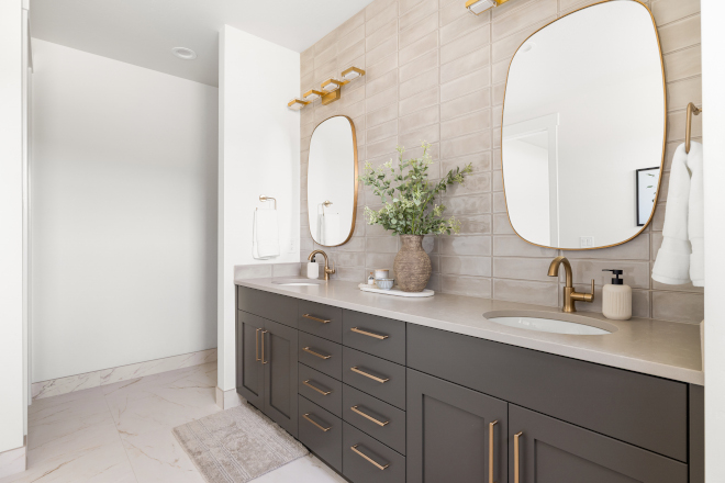 Idaho bathroom with large 30x30 Calacatta Oro porcelain floor tiles