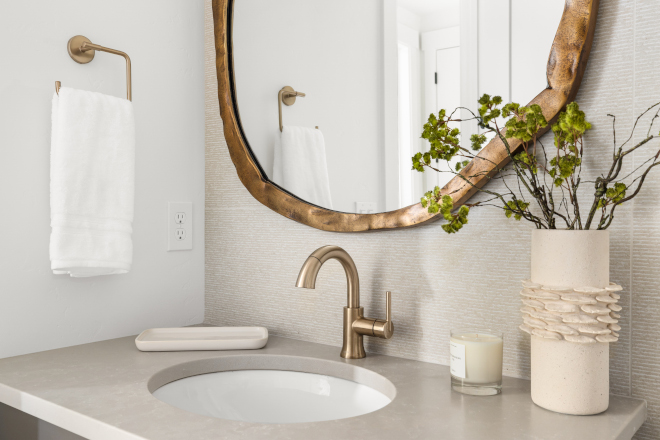 Powder room cabinets painted Sherwin Williams Urbane Bronze with Silestone Poblenou quartz countertop