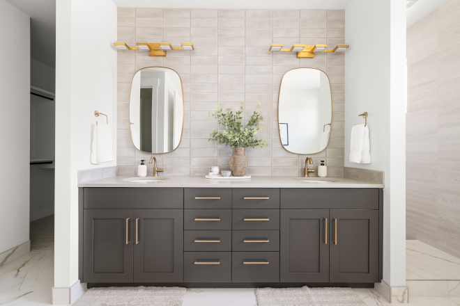 Primary bathroom vanity painted Sherwin Williams Urbane Bronze with neutral accent tiles