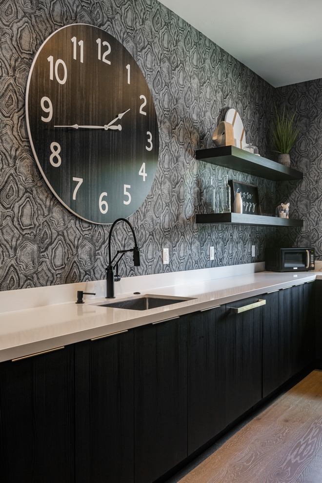 kitchen cabinetry with open bar storage and decorative accents