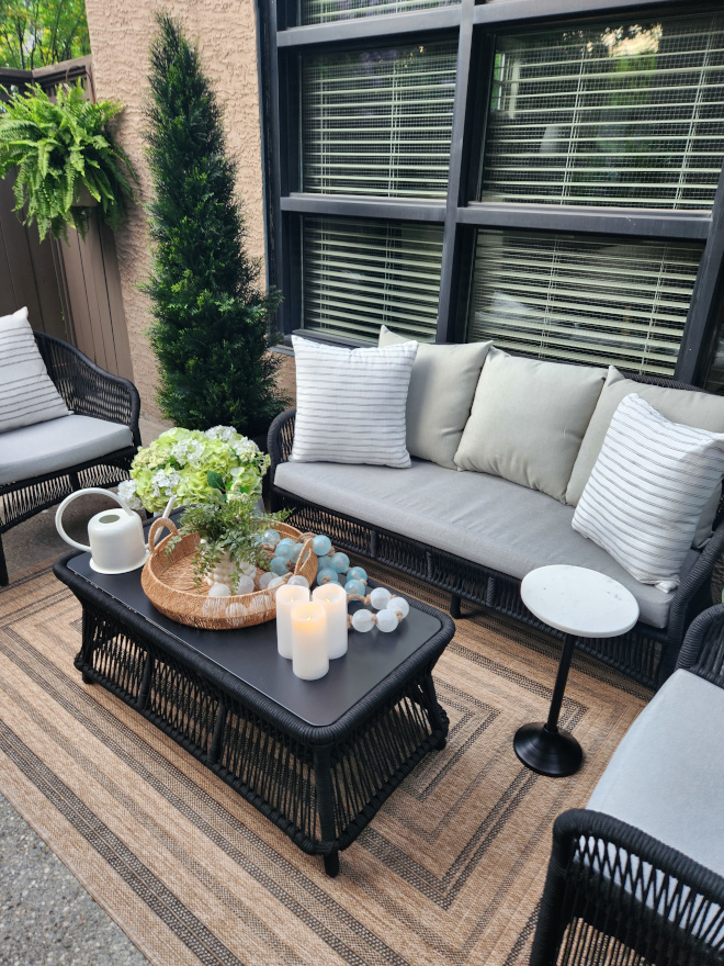 Small Patio Decor Ideas showing small back patio with outdoor seating, outdoor coffee table with outdoor decor and an outdoor rug