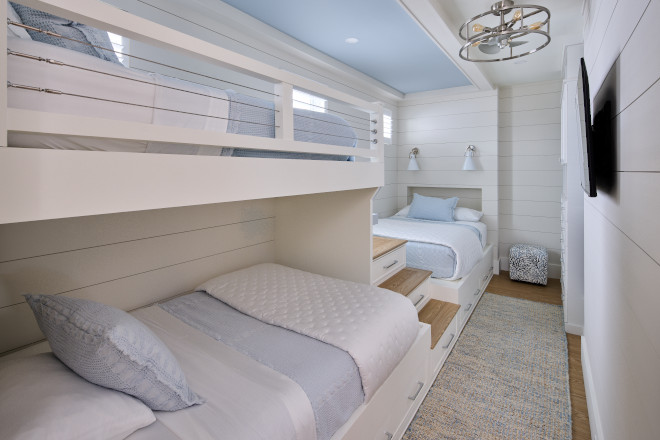 Coastal bunk room with built-in bunk beds, Sherwin Williams Drift of Mist walls, and Benjamin Moore Gently Gray tray ceiling