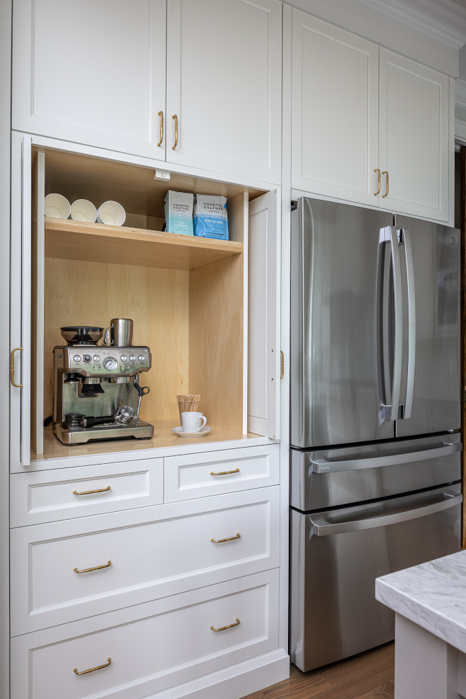hidden-coffee-station-cabinet-ideas Hidden coffee station appliance garage built into Benjamin Moore Steam kitchen cabinetry.