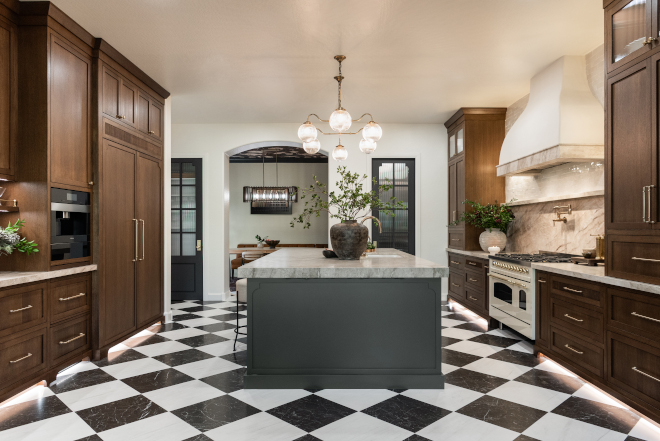 designer-kitchen-renovation-walnut-white-oak-cabinets Designer kitchen renovation featuring walnut stained White Oak inset shaker cabinets, smoky green island and Harlequin marble flooring.