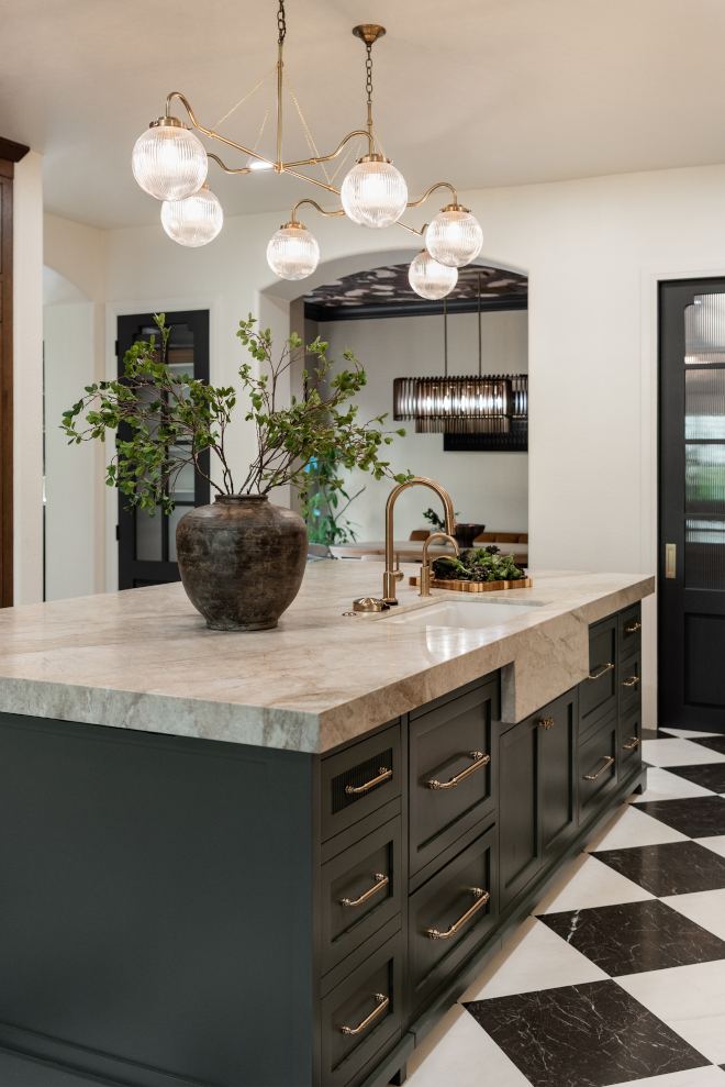 smoky-green-kitchen-island-paint-color Dark smoky green kitchen island paired with walnut stained white oak cabinets and Harlequin marble floors.
