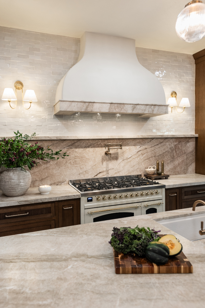 taj-mahal-quartzite-ledge-neutral-zellige-tile-backsplash Leathered Taj Mahal Quartzite backsplash and ledge paired with neutral handmade Zellige tile in a warm luxury kitchen.