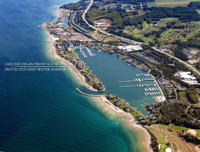 Waterfront Homes. Luxury Waterfront Home Design Ideas. Private Lake Michigan frontage with beach, protected harbor side frontage, 2 boat lifts, dock suitable for a 120 -foot yacht. This waterfront home has it all! #Waterfront #Homes