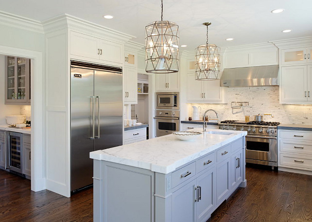 Worlds Away Mariah Pendants. Worlds Away Mariah Pendants over gray kitchen island with white marble countertop with prep sink accented with gooseneck faucet. #WorldsAway #MariahPendants Blue Water Home Builders.