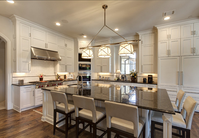 5 seating kitchen island. Kitchen island with 5 counter stools. Kitchen island with 5 counter stools - seating layout. Simmons Estate Homes.