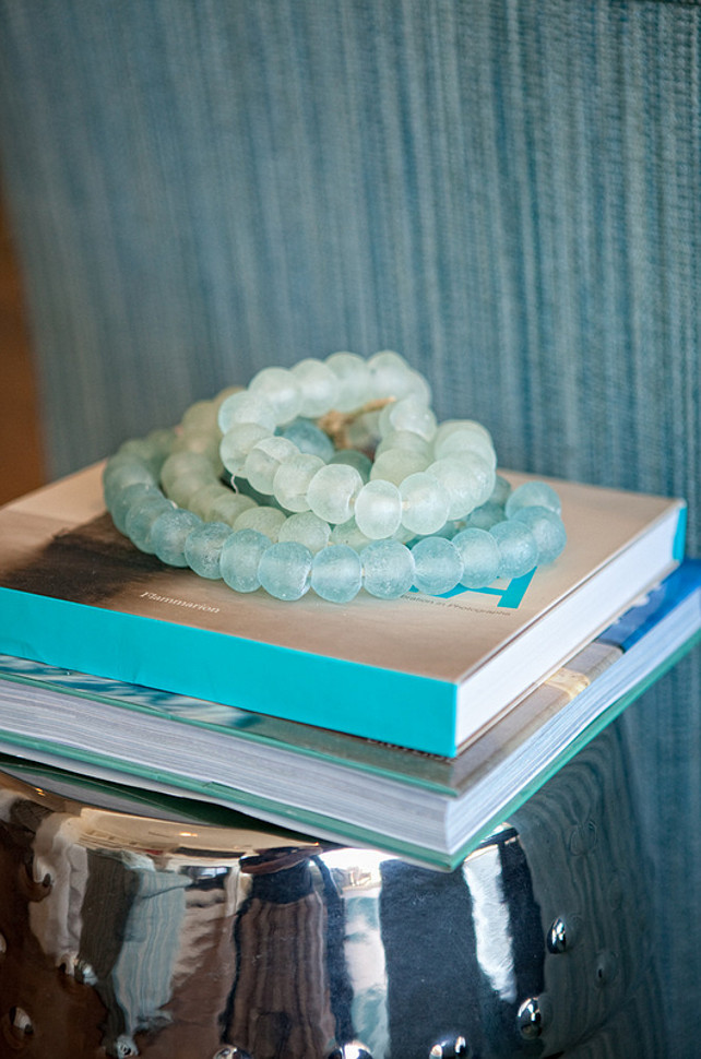 Side table Decor Ideas. Coastal Side Table Decor. The glass bead vase fillers are from Pottery Barn. Decorating Books. Side Table. Coastal. Turquoise Decor. #SideTable #Decor #Turquoise #Coastal Brooke Wagner Design.