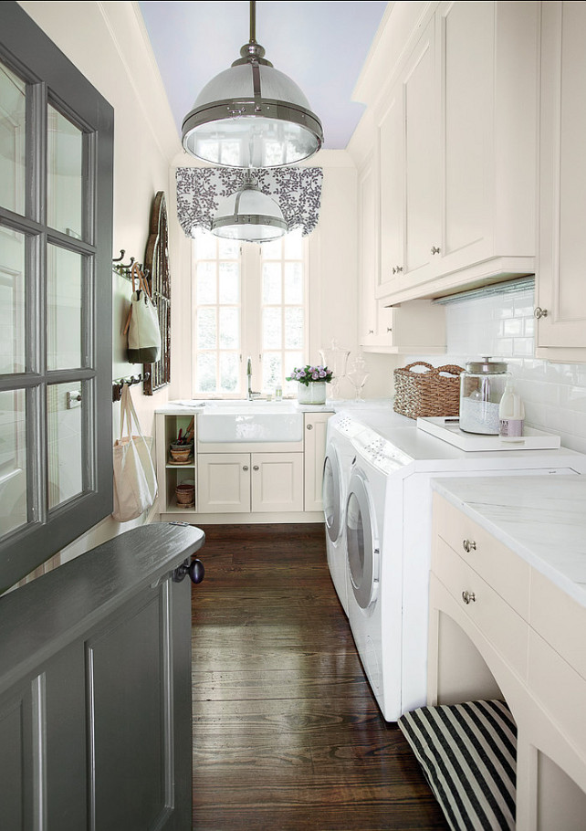 Laundry Room Design Ideas. Pendants are the 18-inch “Clemson Prismatic Single by Restoration Hardware”. Curtain fabric: “Smokebush in Orchid on White Linen by Galbraith & Paul”. Dutch Door Paint Color: Sea Gull Grey (30YY 42/083) by Devoe Paint. Ceiling Paint Color: Carly’s Color (90BB 58/072) by Devoe Paint. #LaundryRoom #LaundryRoomDesign