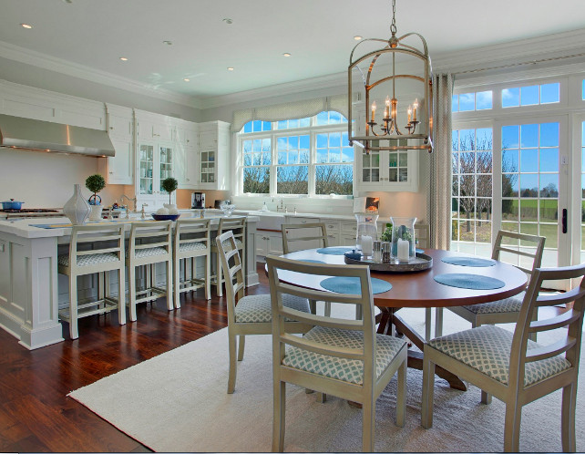 White Kitchen. This spacious white kitchen is perfect for family living, with plenty of space for cooking and family gathering. #WhiteKitchen #FamilyKitchen #Interiors