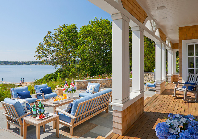 Porch. Coastal Porch. Coastal Porch and Patio. Shingle home porch. Shingle home patio. Coastal Home Porch. Coastal Home Patio. This backyard shows what a dream of having a beach house is all about... you can feel the serenity and beauty of this place. #Porch #Patio #Coastal #CoastalHome #ShingleHome SLC Interiors. 