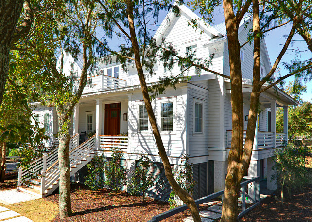 Andersen windows, artisan homes, artisan hardi-siding, beach house, copper flashing, copper lanterns, Custom Mahogany door, gas lanterns, horizontal railing, ipe, ipe decking, island house, metal roof, painted louvers, painted siding, raised house, stucco pier, Sullivan's Island, white exterior Ink Architecture.