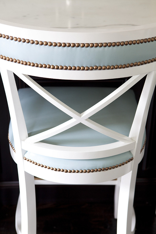 Bar Stool. Counter Stool. Kitchen counterstool ideas. White x-back island counter stools upholstered in baby blu leather with nailhead trim. Anne Hepfer Designs.