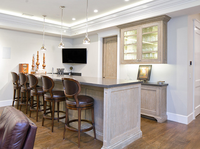 Basement Bar. Basement Bar Cabinet. Basement with white wash bar cabinet. #Basement #BasementBar #Bar Brandon Architects, Inc.