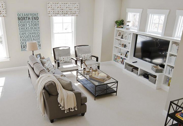 Basement Family Room. Transitional Basement Family Room. #BasementFamilyRoom The paint color in this neutral family room is Sherwin Williams Sandbar. 