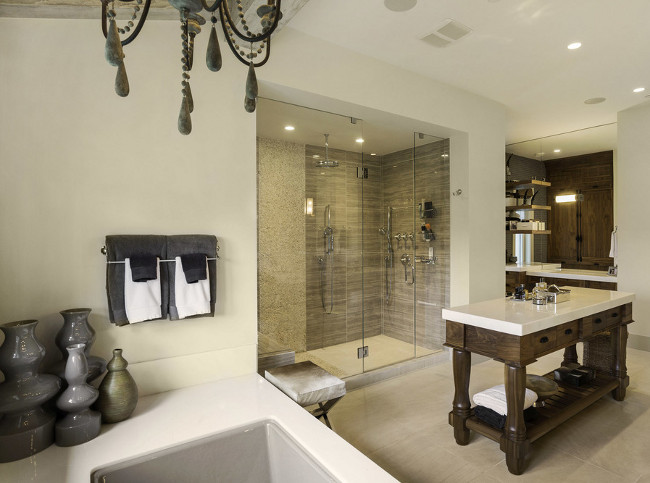 Bathroom island. Bathroom with island for extra storage and counter space. #Bathroom #BathroomIsland Michael Grahame via Home Bunch.