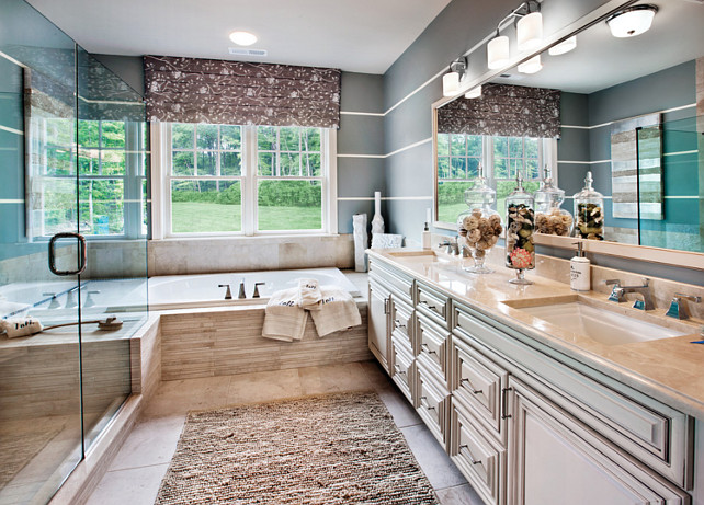 Striped Wall Bathroom Ideas. Painted Striped Wall. The main paint is Sherwin Williams SW7652 Mineral Deposit, the white stripes are Sherwin Williams Honied White SW7106. #Bathroom #StripedWallBathroomIdeas Mary Cook