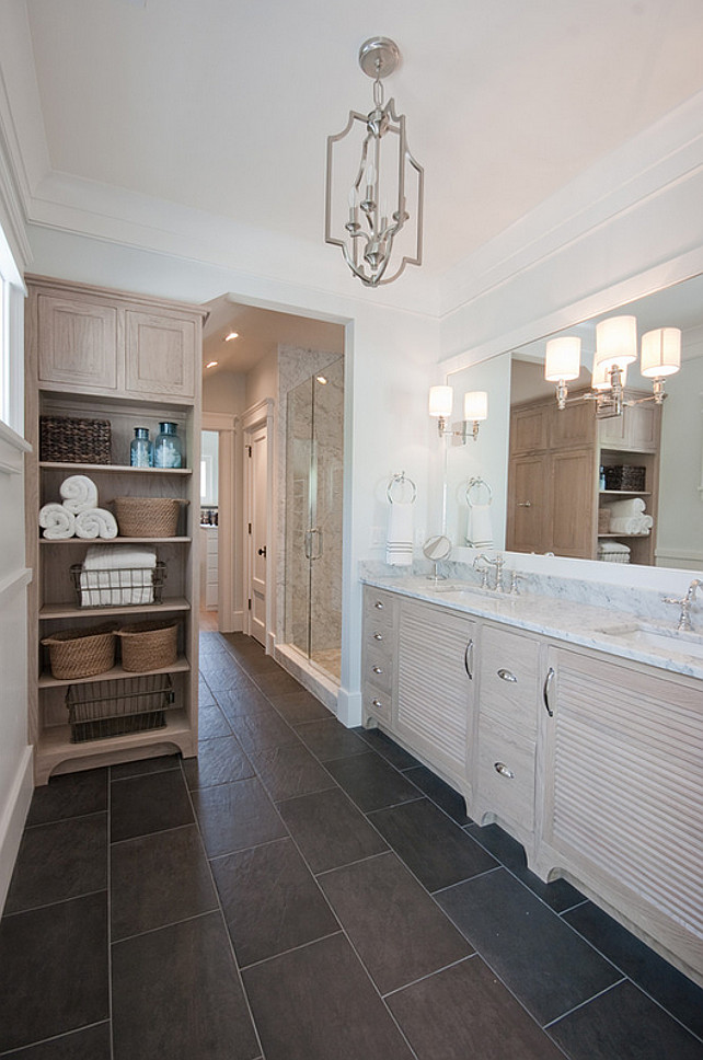 Bathroom. Bathroom Floor Tiles. Brick pattern tile. Bathroom Built-in. Lights on mirror. Louver doors. Master bath. Stone tile. White wash