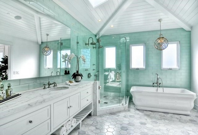 Bathroom. Bathroom with floor-to-ceiling seafoam glass subway tiles. #Bathroom