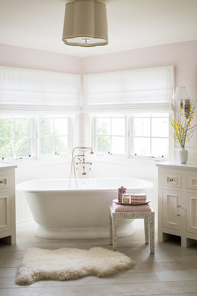 Bathroom. Pale Pink Bathroom. Pale Pink Paint Bathroom. Ivory and Pink Bathroom. Bathroom lighting is Barbara Barry Simple Scallop Pendant. #Bathroom #IvoryBathroom #PalePink #PinkBathroom