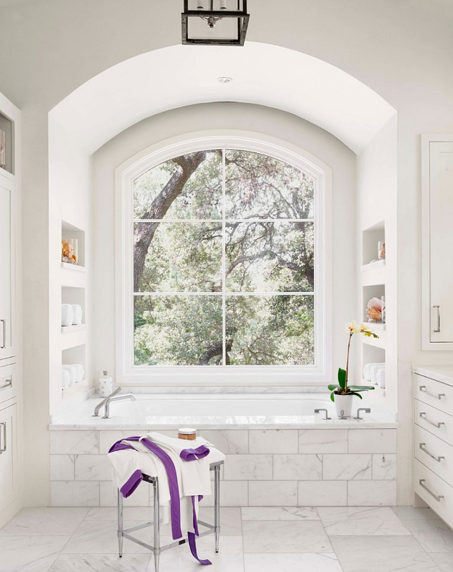 Bathroom. White Bathroom with big window above bathtub. #Bathroom #WhiteBathroom #BathroomWindow Ryan Street and Associates