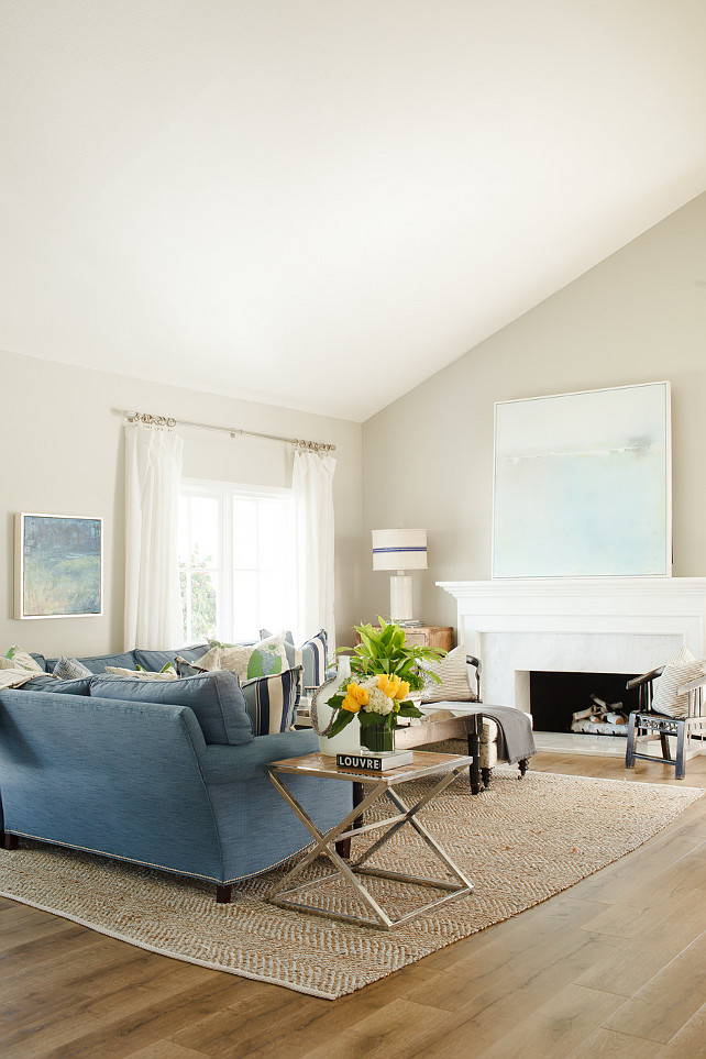 Beach House Living room Ideas. Beach house living room color palette. Neutral paint color with blue and white coastal decor. #BeachHouse #LivingRoom #Coastal Brooke Wagner Design