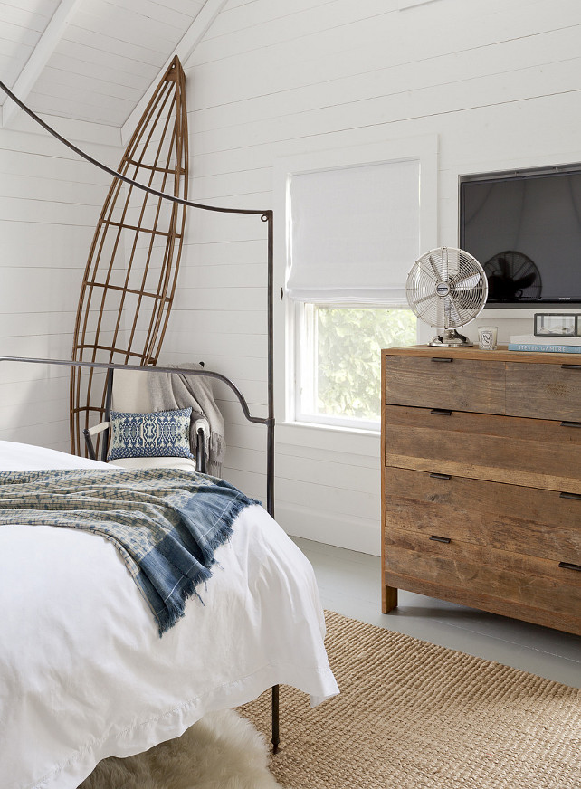 Beachy Bedroom. Beach House Bedroom. Beach house bedroom with beachy decor. Bed is the Anthropologie Italian Campaign Canopy Bed. Reclaimed wood dresser is by Restoration Hardware. Rug is jute. #bedroom