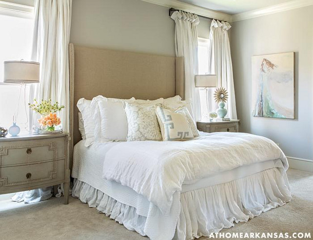 Bedroom. Romantic Bedroom with linen wingback headboard and a ruffled white bed skirt. #Bedroom #RomanticBedroom #wingbackheadboard #ruffledbedskirt. At Home in Arkansas
