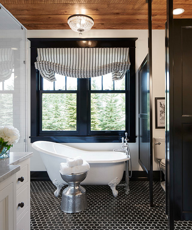 Benjamin Moore Black . The Window Trim and Bathroom Partition paint color is Benjamin Moore Black 2132-10 in a High Gloss finish. #BenjaminMooreBlack #BenjaminMoorePaintColors #BathroomPartition Martha O'Hara Interiors.