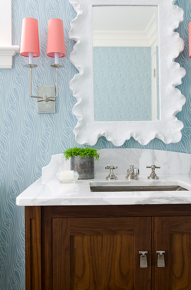 Blue Turquioise Wallpaper. Powder room with blue turquoise wallpaper, white mirror and coral sconces. #Turquoise #Wallpaper #PowderRoom Kristina Crestin Design.