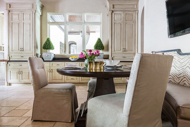 Breakfast Nook. Kitchen Breakfast Nook. Kitchen Breakfast Nook with Limestone Floors. #BreakfastNook #Kitchen #LimestoneFloor Laura U, Inc.