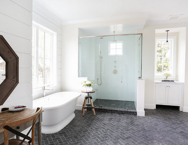 This bathroom is so appealing! I love the layout, the spacious shower with its own bench and the tongue and groove walls. The bathroom flooring is Blue Tumbled Limestone flooring set in a herringbone pattern.