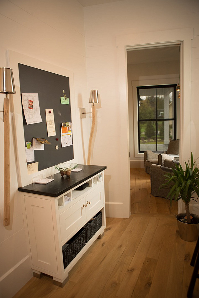 Built-in Cabinet with chalkboard. This is a great spot to place the mail, keys and weekly plans. Hahn Builders.