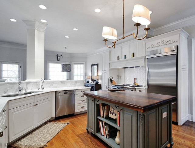 Calacatta Gold Marble and Distressed Black Walnut Heritage Wood Countertop. Kitchen with Calacatta Gold Marble Perimeter Countertop and Distressed Black Walnut Heritage Wood Island Countertop. #CalacattaGoldMarblePerimeterCountertop #WoodIslandCountertop CR Home Design K&B (Construction Resources). Kitchen Perimeter & Island Countertop Ideas