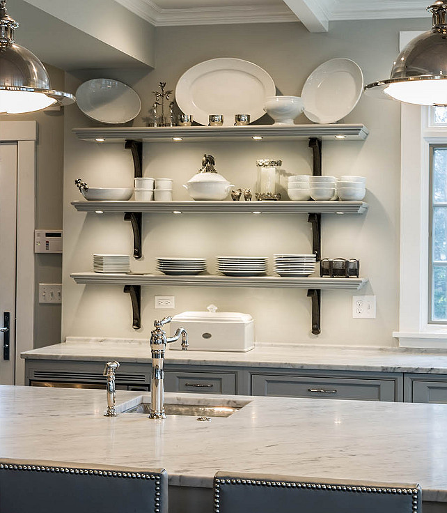 Carrera marble Kitchen Countertop. Kitchen with Carrera marble countertop, open gray kitchen shelves with white china display. #Kitchen #CarreraMarble #OpenShelves #KitchenCountertop Past Basket Design.