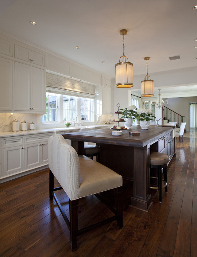 Classic White Kitchen. Classic white kitchen with bench on island. #Classic #Kitchen #WhiteKitchen Matthew Thomas Architecture, LLC.