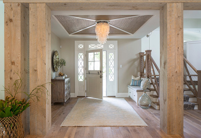 Coastal Foyer with Reclaimed beams and capiz chandelier. Troy Thies Photography.
