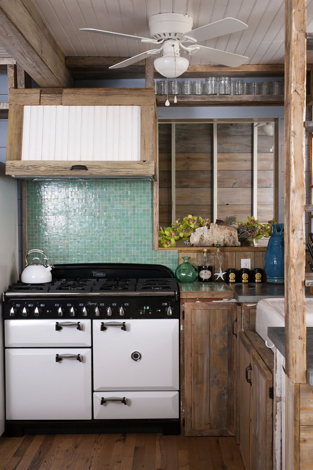 Coastal Kitchen with reclaimed cabinet. White AVA stove. #Coastal #Kitchen #CoastalKitchen #ReclaimedWood #ReclaimedCabinet OUTinDesign.