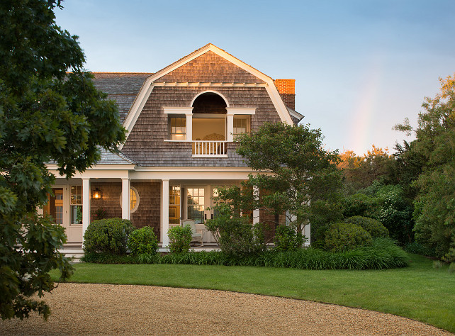 Cottage Exterior. Beach Cottage Exterior. Balcony. Beach house. Cape cod. Cedar shake. Collumns. Double gambrel. Gambrel roof. Martha's vineyard. Massachusettes. New England. Ocean. Porch. Shake roof. Shingle. Summer house. Vacation. Vacation house. Vineyard. Waterfront. Wood shake. Wood shingle. Wrap around porch.